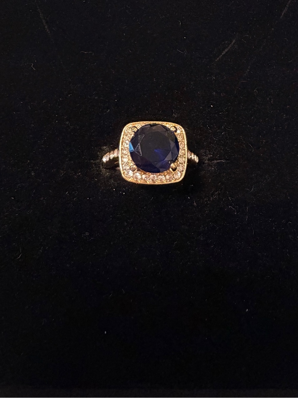 Stainless Steel Gold Overlay with Deep Blue Center Stone and Pavé Halo Ring.